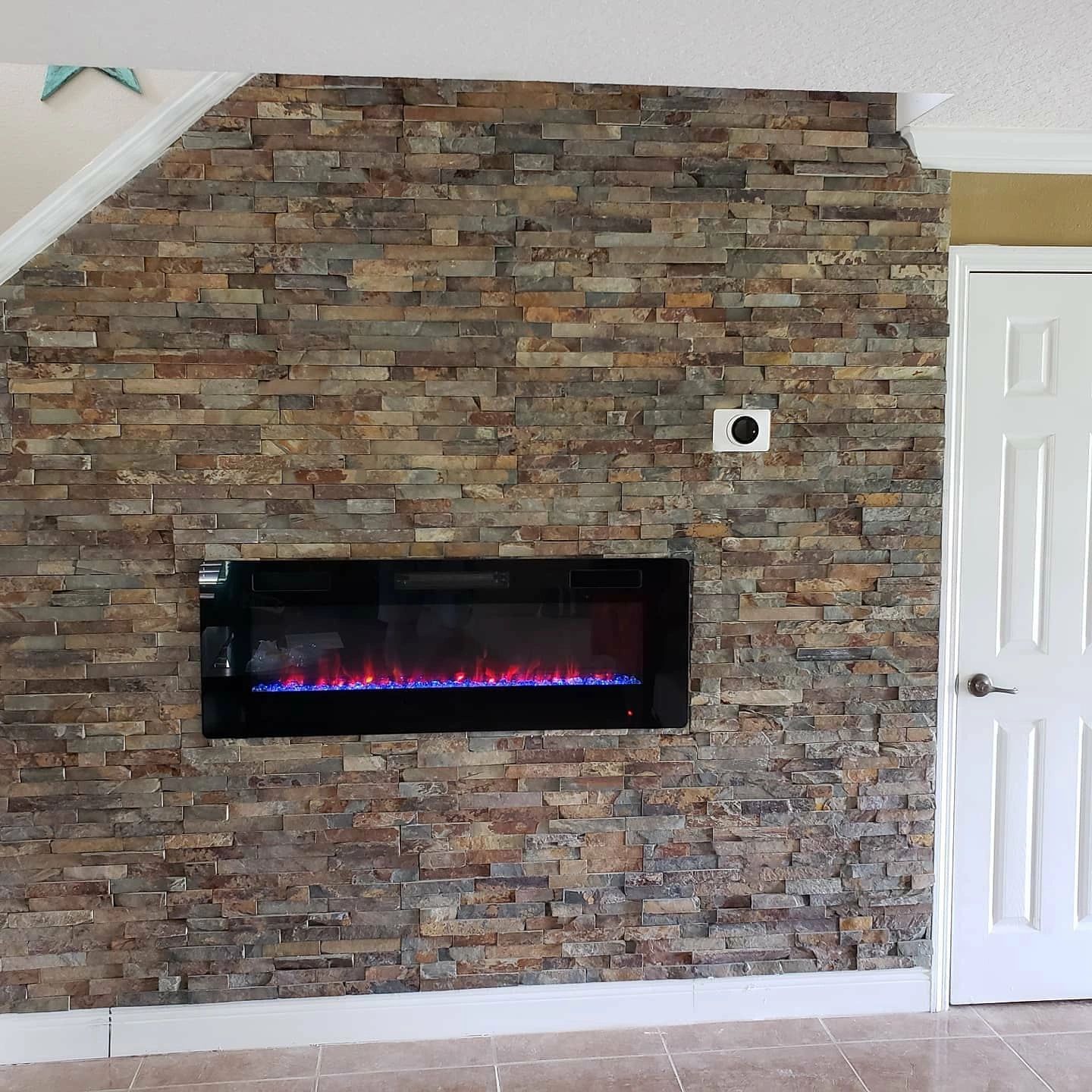Drywall removal, electric fireplace & Nest thermostat installation, stone work.
